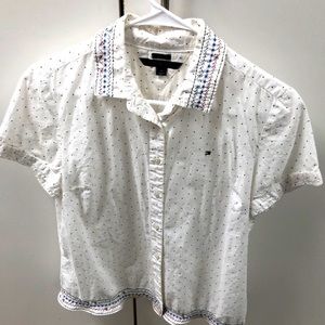 This is a girl’s custom embroidered shirt that is one of a kind